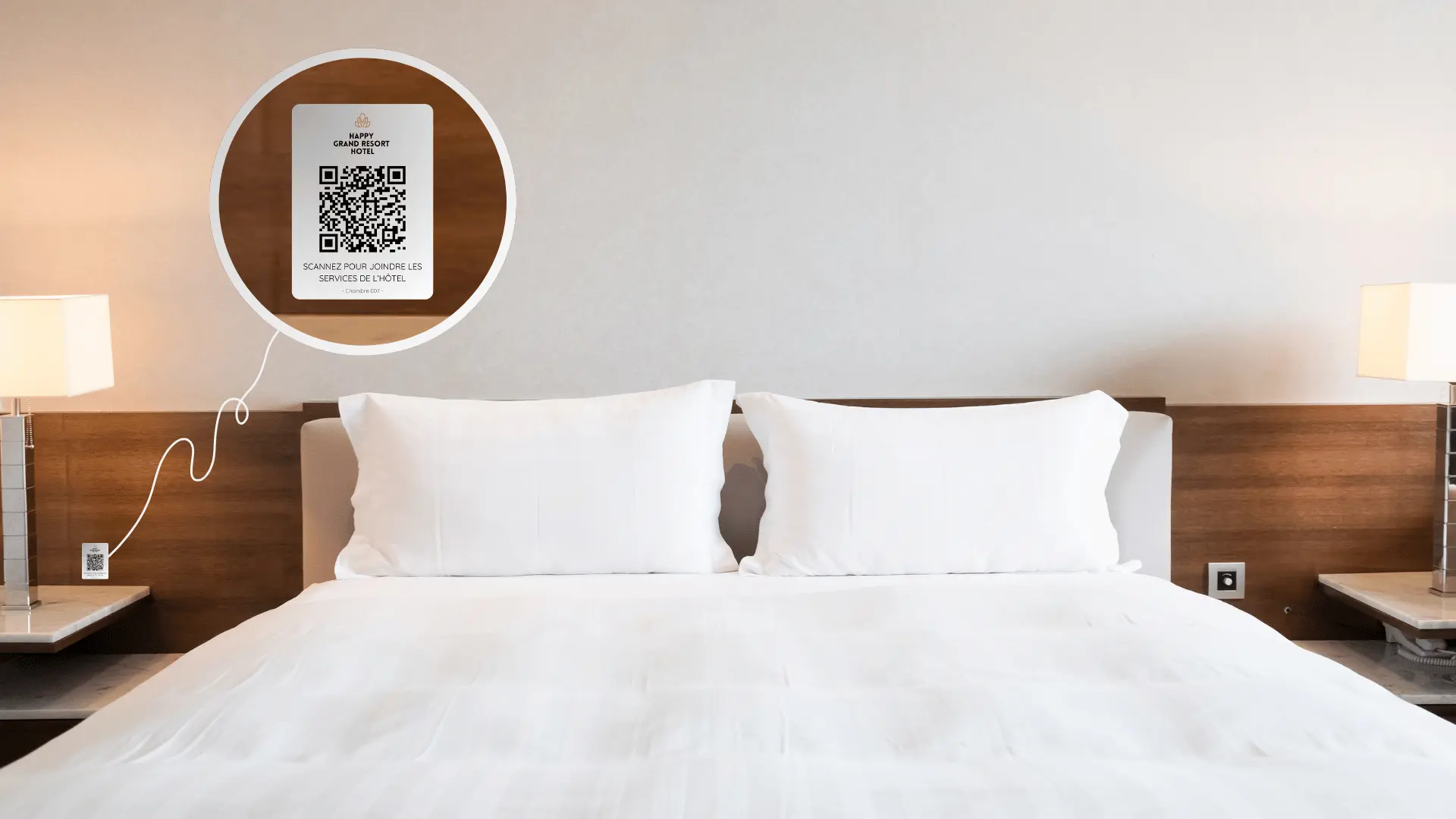 A picture of a bed in a hotel room, with the hapiix HotelCall QR Code solution available